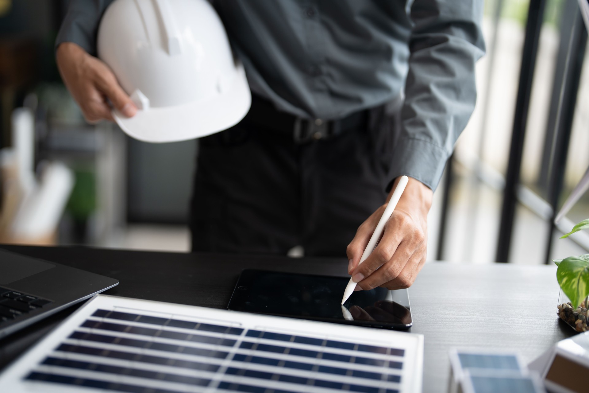 Engineer planning for Solar panels green energy Business man working Innovation  green eco friendly in modern office business  Planing Bio economy for business renewable energy eco friendly professional Engineer
